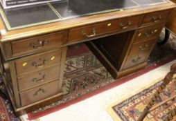 WITHDRAWN - A 20th Century mahogany desk,