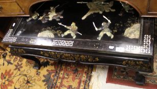 A black lacquered and chinoiserie decorated coffee table,