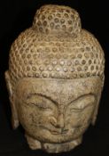 A Khmer style carved stone Buddha head CONDITION REPORTS Probably late 20th century