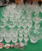 A set of six cut glass wine glasses,
