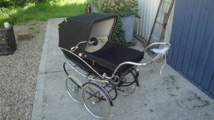 A 1961 Silver Cross York model pram together with a painted childs high seat CONDITION