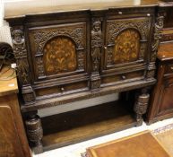 A 20th Century oak cupboard in the 17th Century manner,