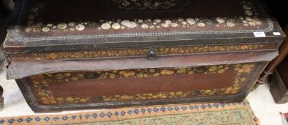 A Victorian camphor wood trunk with leather and brass covering with painted floral decoration