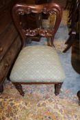 A set of eight reproduction mahogany kidney back dinig chairs in the William IV taste,