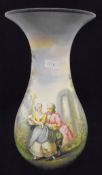 A French Pottery baluster shaped vase with painted decoration of a courting couple