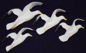 A graduated set of four Beswick wall mounted seagulls (658-1, 2,