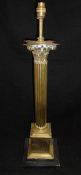 A large brass table lamp base,