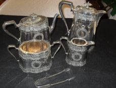 An electro-plated silver four piece tea and coffee service of tapering form with foliate engraving