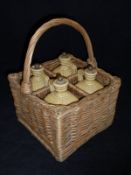 Four stoneware bottles marked "Irish Whisky", "Brandy", "Gin",