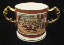 An Aynsley loving cup decorated with panel of racehorses entitled "Grandstand Goodwood 1838" and