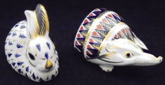 A Royal Crown Derby figure of a hedgehog and another of a rabbit with original boxes