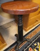 A vintage cast iron "Singer" stool with round wooden adjustable seat CONDITION REPORTS