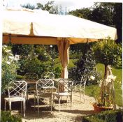 A substantial outdoor gazebo with cream fabric top and sides CONDITION REPORTS