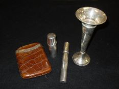 A silver cigar holder of cylindrical form (by Chrisford & Norris, Birmingham 1900),