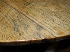 A 20th Century oak dining table in the 18th Century manner,