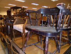 Four Ercol stick back chairs with elm seats and beech frames,