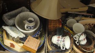 Two boxes of various china, baskets, trays, photograph frames, lamps,