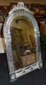 An arched top dressing table mirror,