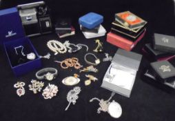 A box of various costume jewellery and a box of glass and chinawares