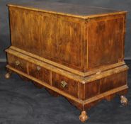 An 18th Century yew wood veneered and feather-banded mule chest,