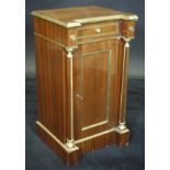 A 19th Century Russian mahogany pot cupboard with brass decoration,