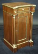 A 19th Century Russian mahogany pot cupboard with brass decoration,