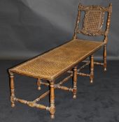 A 19th Century walnut day-bed in the 17th Century style,