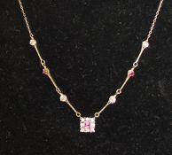 A ruby and diamond necklace, the central pendant set with a square ruby within eight diamonds,