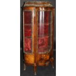 A 19th Century mahogany and inlaid Vitrine of shaped form with applied brass decoration,