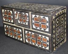 A 19th Century Middle Eastern bone and tortoiseshell inlaid chest of five drawers,