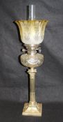 An Edwardian silver and cut glass table oil lamp by Goldsmiths & Silversmiths Company, Sheffield,