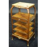 A circa 1900 French kingwood whatnot, the Siena type marble top within a gilt brass edge,
