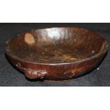 A dark oak adzed fruit bowl by Robert Thompson of Kilburn (The Mouseman) with typical mouse motif,