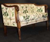 A Regency mahogany framed two seat salon sofa, the frame with reeded decoration,