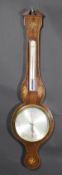 A 19th Century mahogany and inlaid barometer with shell and flower head decoration,