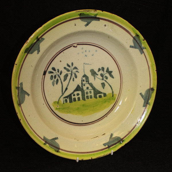 A 19th Century slip ware jug decorated with a yellow line slip decoration with yellow rim on a - Image 2 of 2