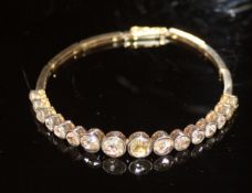 A 16 stone rose cut diamond bracelet with un-marked gold and white gold mounts,