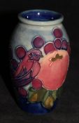 A 20th Century Moorcroft "Blue Finches" vase of small proportions, designed by Sally Tuffin,