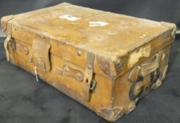 A vintage leather suitcase with brass studwork to the exterior and initialled "GB",