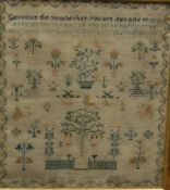 An early Victorian needlework sampler by Harriet Clements depicting Adam and Eve amongst vases of