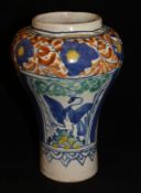 A circa 1750 Mexican puebla drug jar of inverted baluster form,