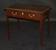 A late 18th Century mahogany rectangular side table with cavetto moulded edge above a single drawer,