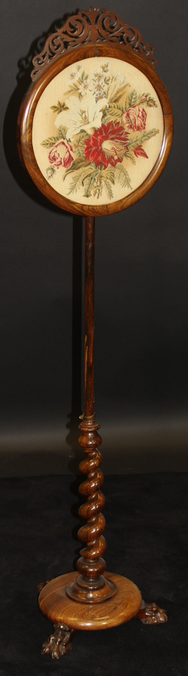 An early Victorian rosewood pole screen,