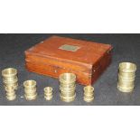 A cased set of standard Apothecaries measures,