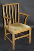 A Castle Bros oak stick back carver chair,