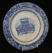 A 19th Century blue and white bowl transfer decorated and printed with a blazon of The City of