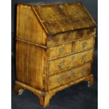 A 20th Century walnut bureau in the early 18th Century manner,