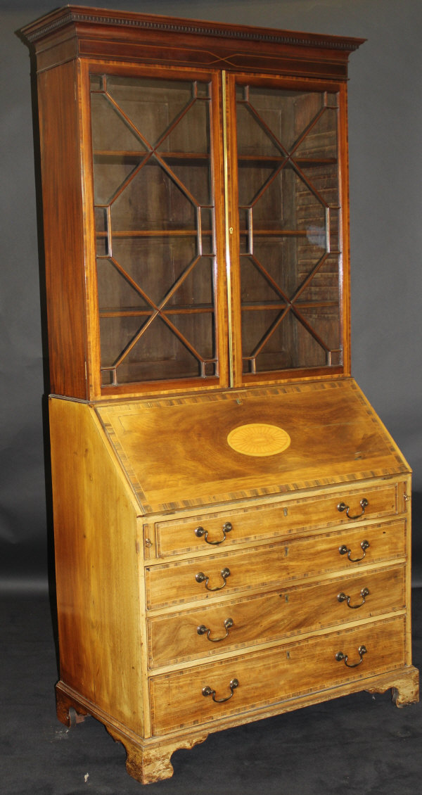 A Regency mahogany and rosewood cross-banded bureau bookcase,