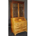 A Regency mahogany and rosewood cross-banded bureau bookcase,