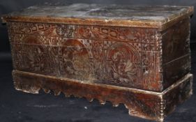 A 17th Century Italian cedar coffer, the 3 plank top with cleated lip support and iron hinges,